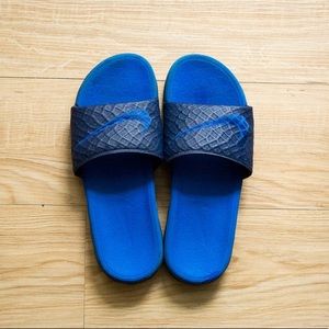 blue nike slides